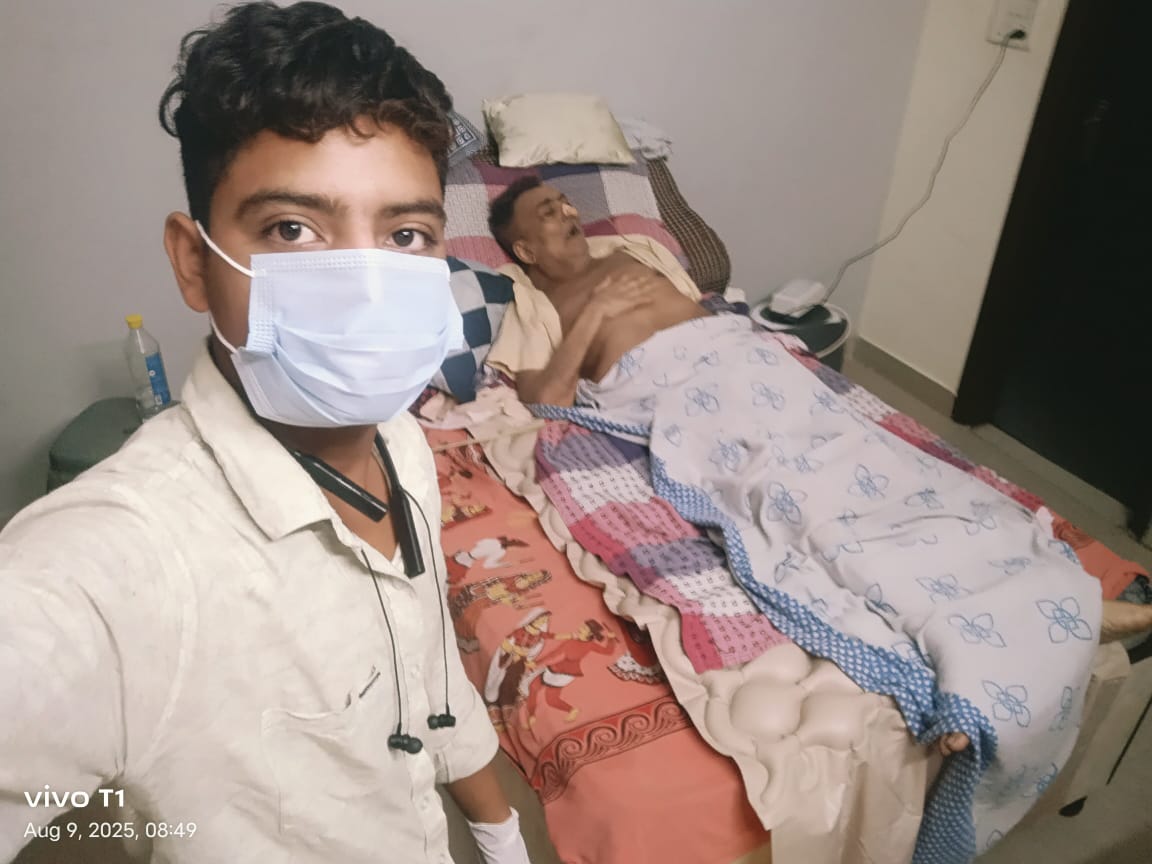 Two male caregivers in medical scrubs